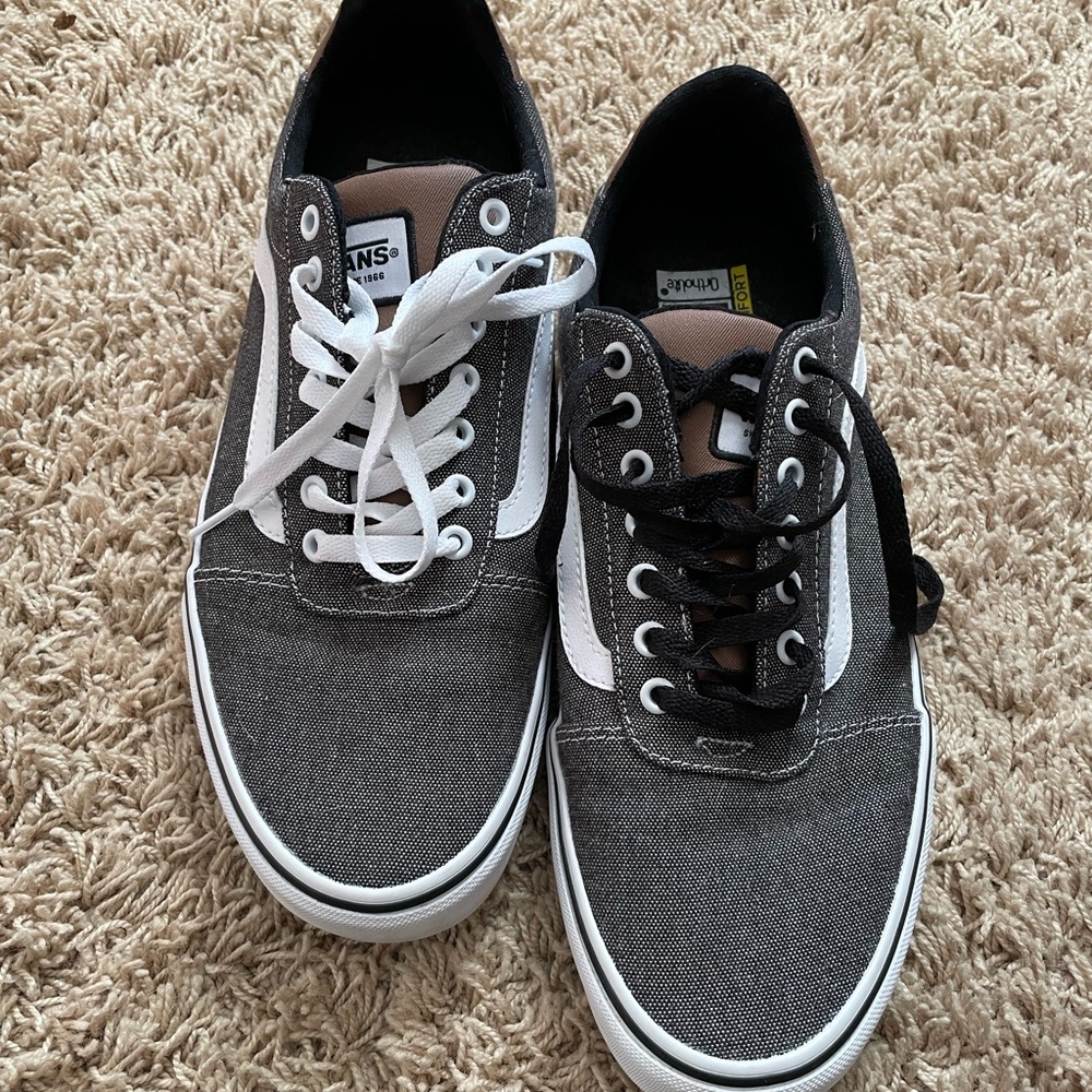 Brand new never worn Vans. Men’s size 12. Comes with white and black laces.
